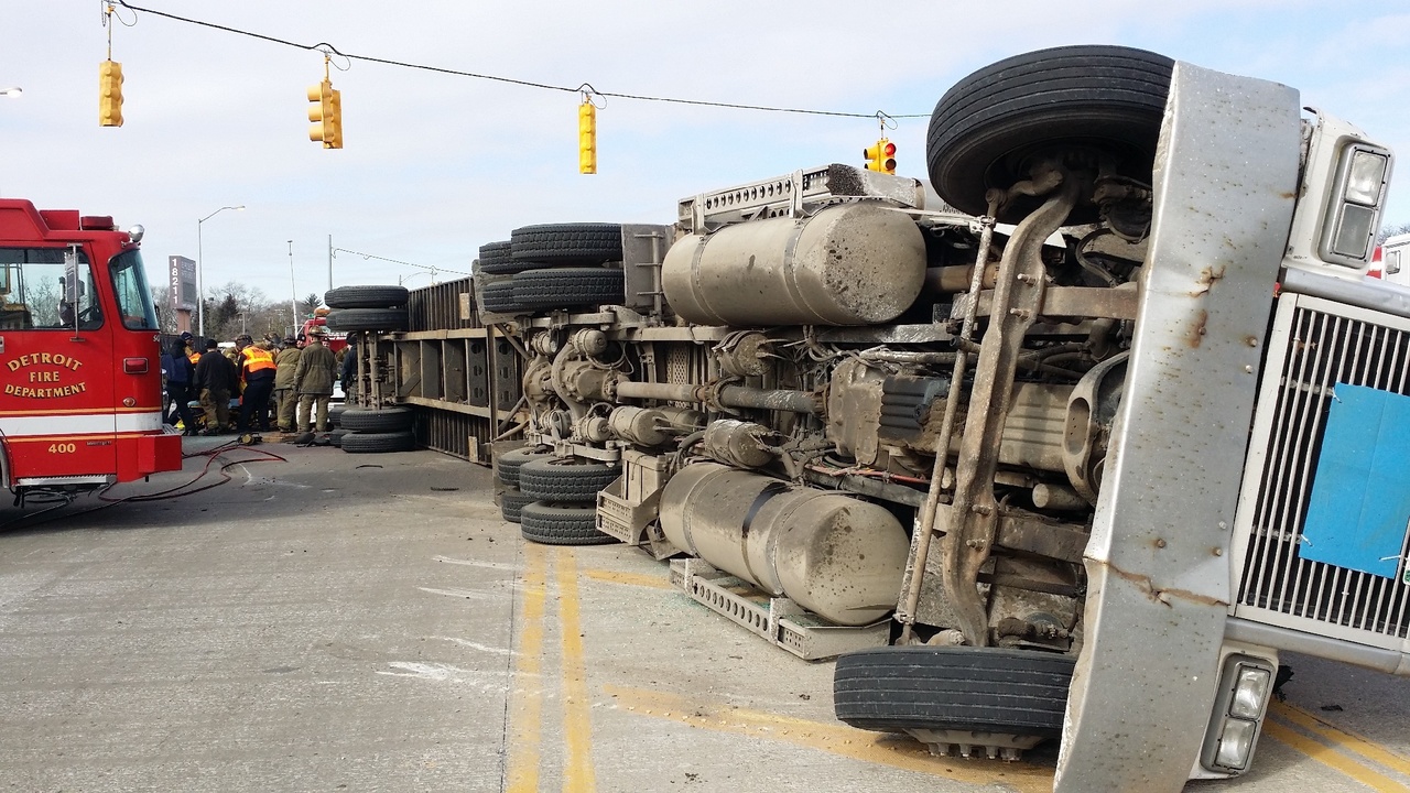 3 dead after car is crushed by semitruck in Detroit