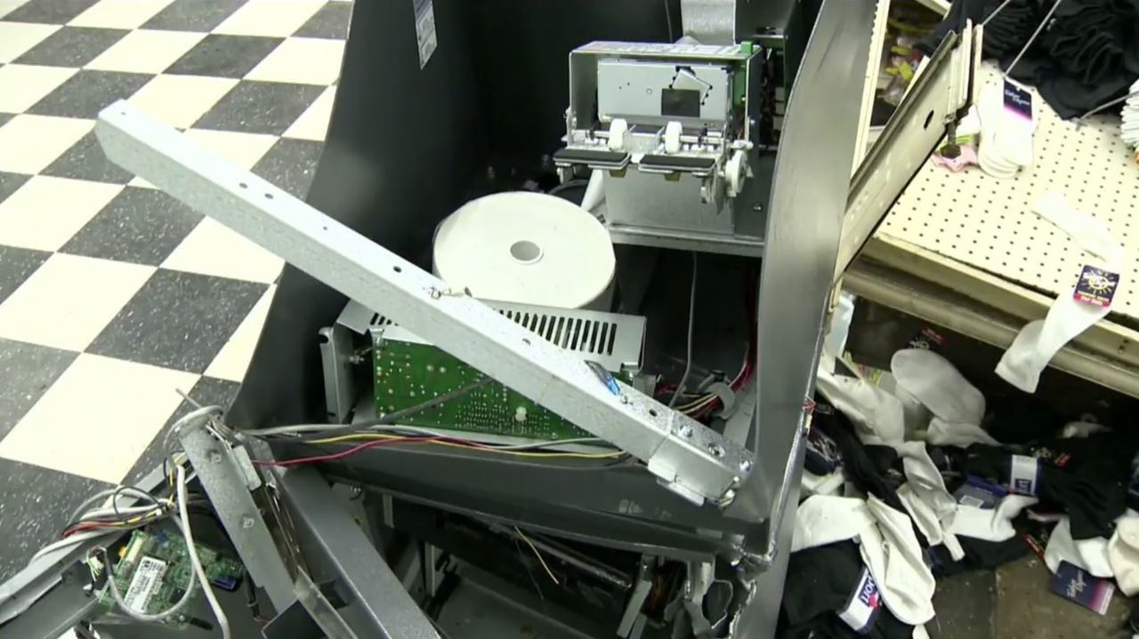 Men break into Detroit liquor store, rip apart ATM - WDIV Detroit