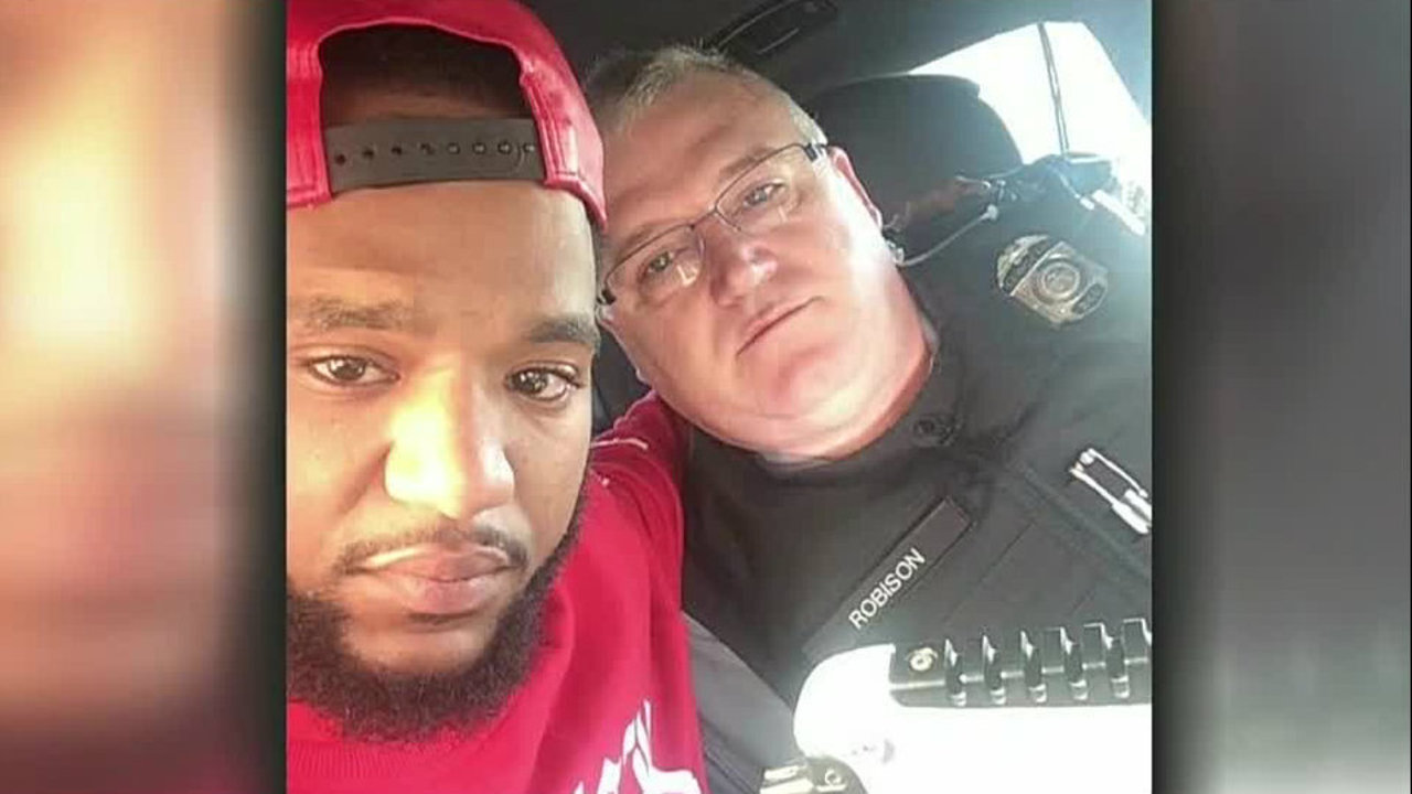 Cop drives man 100 miles to family in Detroit to grieve death... - WDIV Detroit