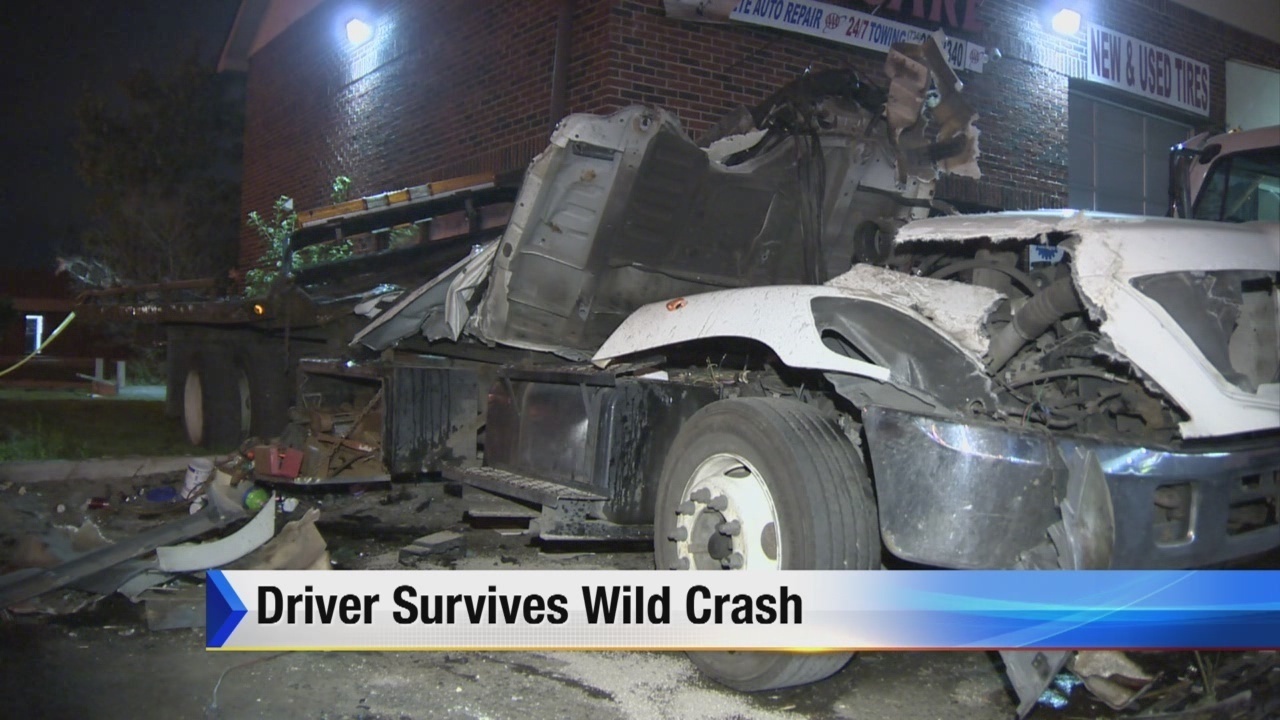 Car goes airborne and crashes into building in Southgate