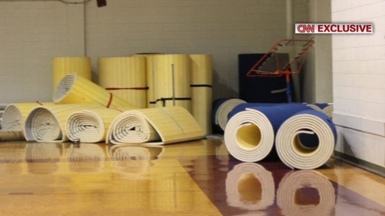 Parents see answers in death of son found in gym mat