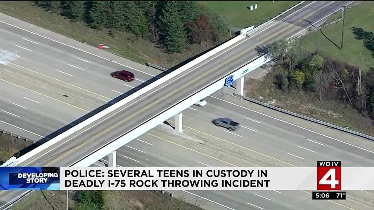 authorities several teens in custody after rock thrown from