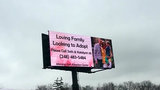 Shelby Township couple use billboard to aid in adoption process
