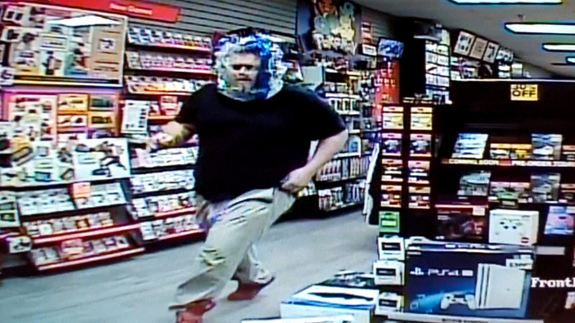 gamestop burglar attempts to disguise himself with see through
