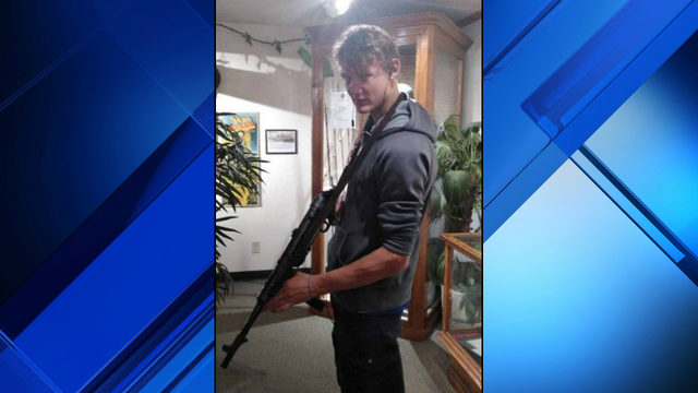 Florida teen charged over gun photo, "no school" threat